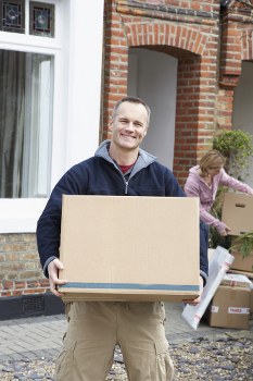 Removal team planning a move in a West Kensington residential street