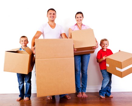 Removal van and packing boxes during a West Kensington move