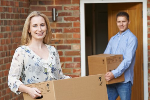 Packing boxes and materials for a home move in West Kensington