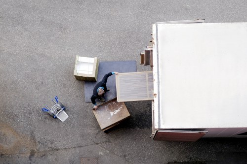 Business furniture being prepared for transport on a local West Kensington move