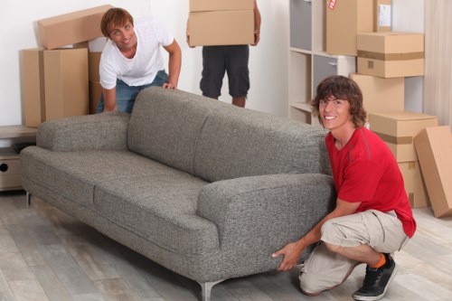 West Kensington moving team loading items carefully into a van