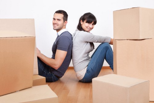 A removals team loading furniture for a quick move in West Kensington