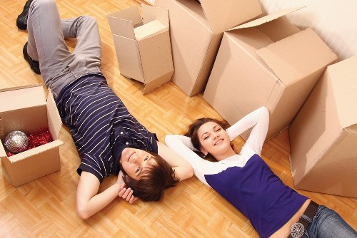 Packed boxes and furniture prepared for a West Kensington house removal
