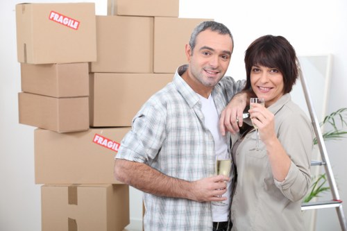 Local movers handling furniture protection during a West Kensington relocation